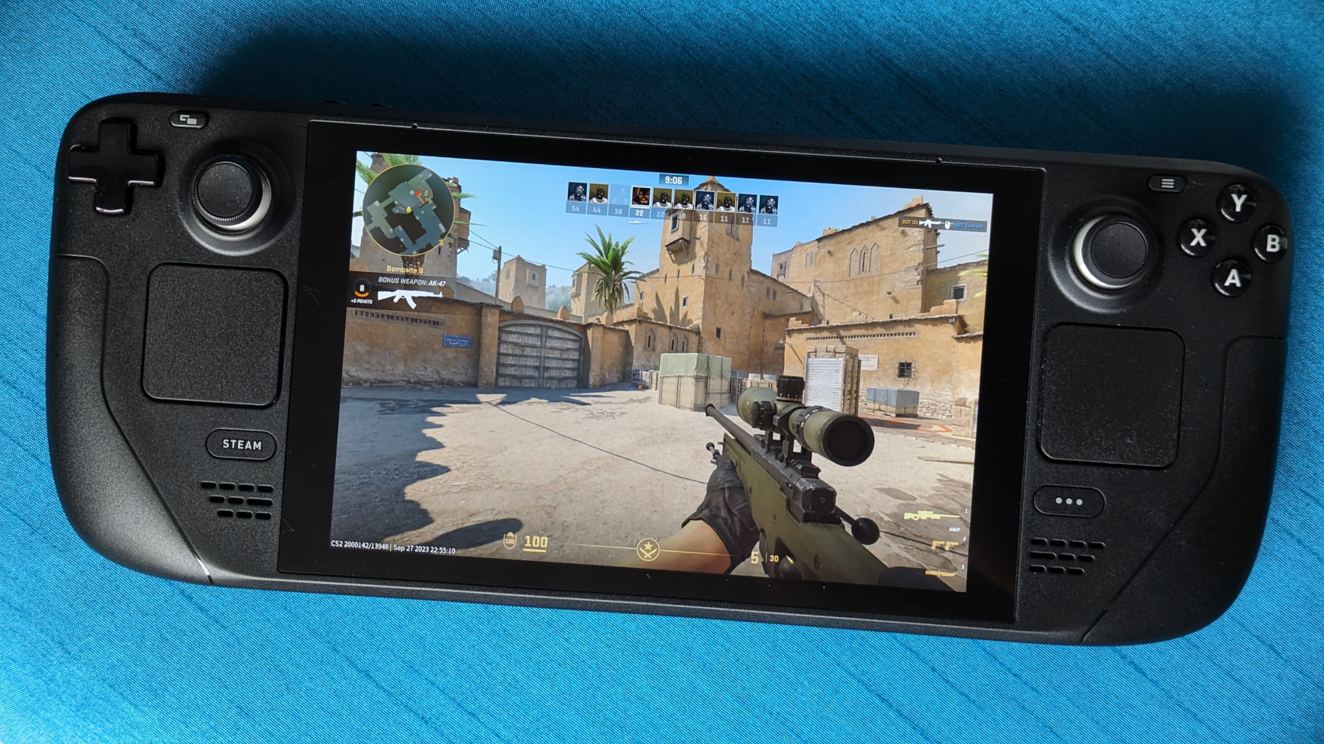 Counter-Strike 2 (CS2) running on a Steam Deck against a blue background