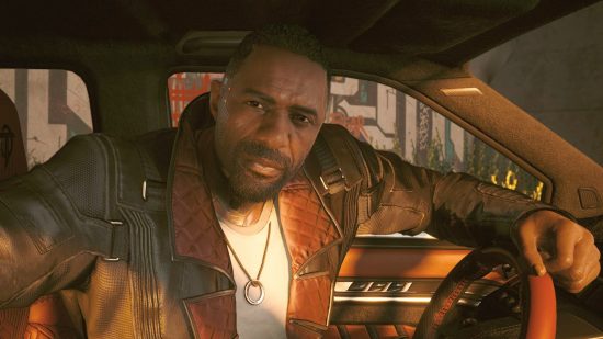 Cyberpunk 2077 Phantom Liberty review: Solomon Reed looking towards V while the pair sit parked in a car.