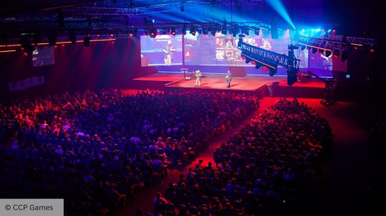 The Eve Online arena is bathed in red and blue light as a crowd fills the room