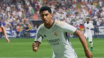 EA Sports FC 24 best midfielders: a football players on the pitch wearing a white kit.