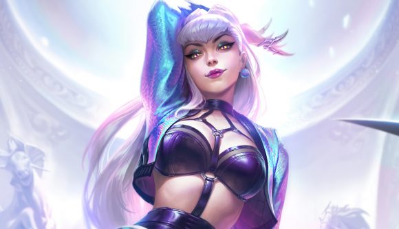 League of Legends' K-pop band KDA are back, but not for Worlds: A pink haired woman with claws stands with her hand bent behind her head wearing a silver bomber jacket and a black leather bralette