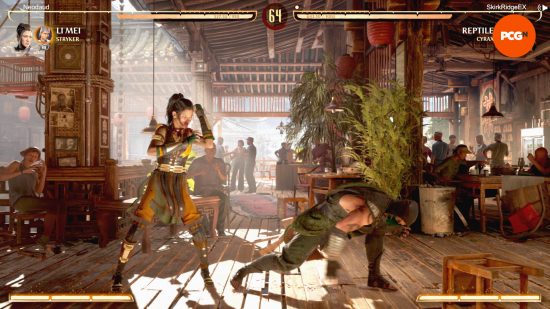 Mortal Kombat 1 review: Reptile is trying to sweep Li Mei who is blocking. The two are fighting inside a restaurant. This screenshot is of the online mode.