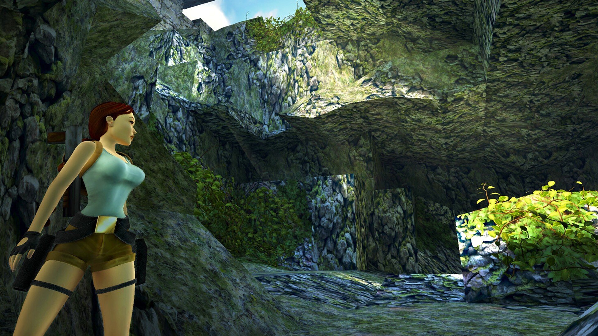 Lara Croft looks into a mossy cave in Tomb Raider I-III Remastered.