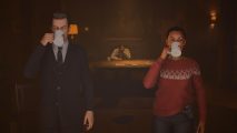 Alan Wake 2 review: Alex and Saga standing drinking coffee while Alan sits at a desk writing stressfully.