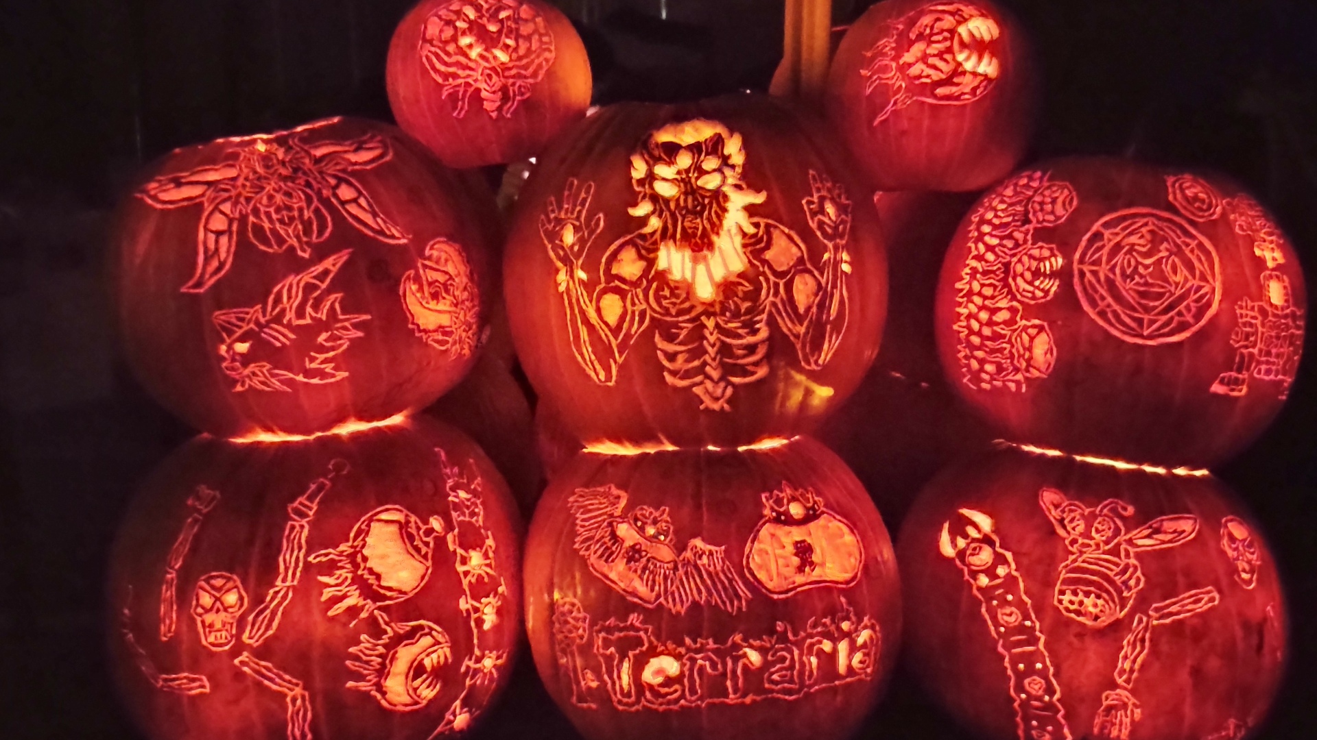 Terraria-themed carved pumpkins