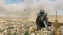 AC Mirage mods: a hooded assassins perches atop a huge tower.