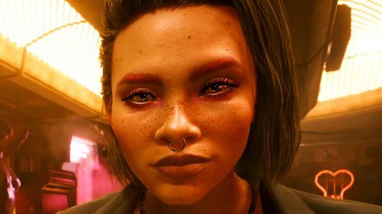 Cyberpunk 2077 sales rise with Phantom Liberty - A freckled woman looks at you inquisitively in a bar.