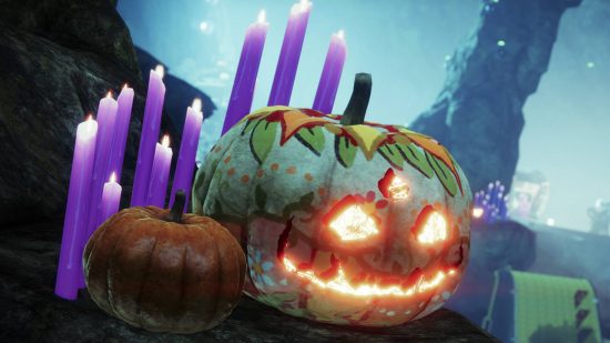 A jack-o-lantern and a smaller pumpkin are sitting in front of some lit purple candles to celebrate Destiny 2 Festival of the Lost.