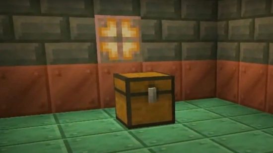 A Minecraft chest in front of a copper bulb in the depths of a Minecraft trial chamber.