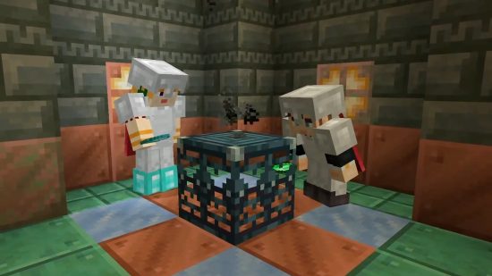 Two Minecraft players look at a new trial spawner, found inside Minecraft trial chambers.