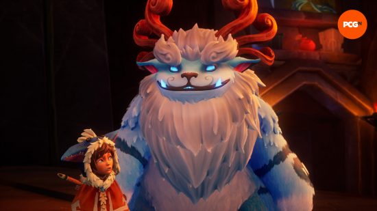 A huge yeti creature with glowing blue eyes and teeth with horns that curve around the back of its head stands next to a small boy wearing a red poncho with a furry hood looking up at the monster