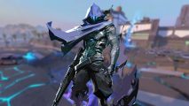 Valorant patch notes - 7.08 update: A ghostly figure in a tattered purple cloak with glowing blue scratch marks for a face stands holding a rifle in his right hand