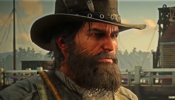 GTA Red Dead Redemption 2 new studio: A man wearing a western-style cowboy hat with a thick beard looks stern
