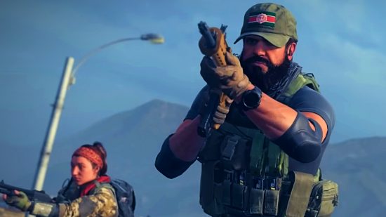 Modern Warfare 3 new records: A man wearing a dark green cap and military gear holds an assault rifle up, a mountain seen behind him