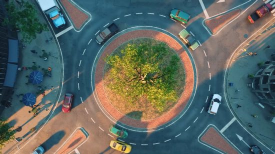 Cities Skylines 2 chaotic roundabouts: a bird eye view of a roundabout with a tree in the middle
