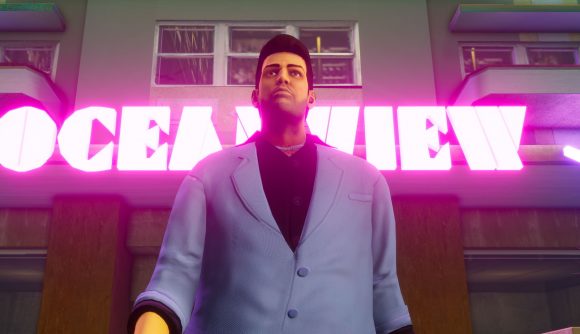Tommy Vercetti from GTA: Vice City standing in front of a neon Oceanview hotel sign.