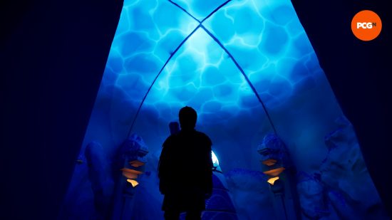 A shadowy figure looks up at a ceiling with a blue watery light on it, with two altars next to them