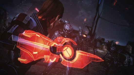 Games like BG3: a woman with a glowy blade on her arm fighting against androids in Mass Effect Legendary Edition.