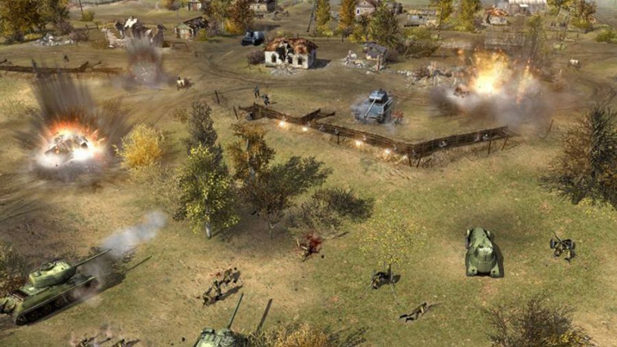 Men of War - Three tanks drive across a field towards a homestead in this WW2 strategy game..