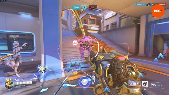 An image of Overwatch 2 combat showing Mercy and a DVA using Defence Matrix