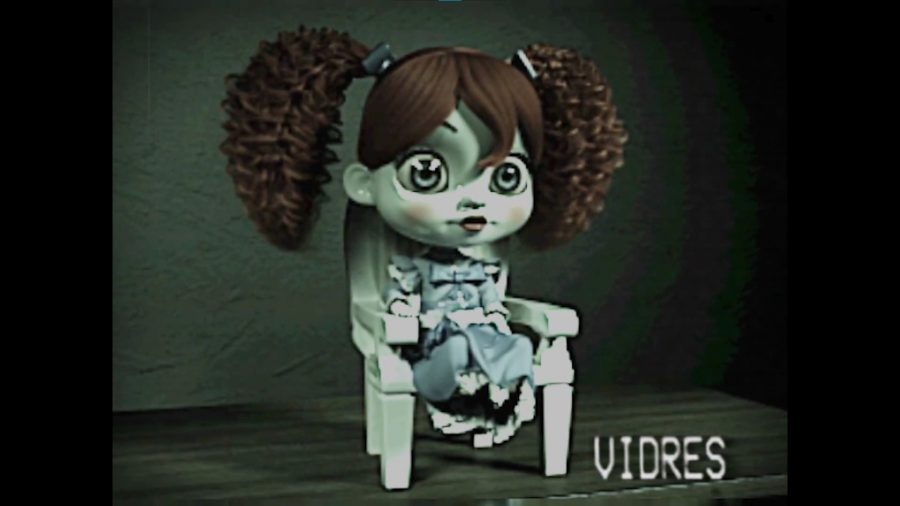 Poppy Playtime, a wide-eyed doll with red hair, sits in a chair in a retro VHS still.
