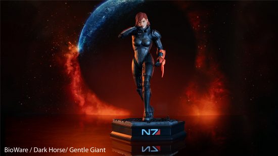A statue of Commander Shepard from Mass Effect, with her energy blade out. 