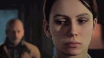 Silent Hill Ascension: a woman looks scarred as a blurry figure is behind them