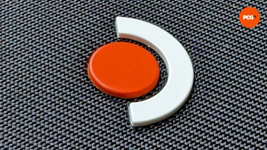 The Steam Deck OLED logo, featuring an orange circle and white crescent