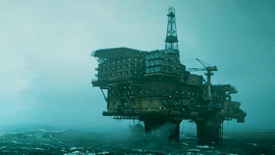 An off-shore oil rig looms out of the sea mist, a setting that we'll become acquainted with following the Still Wakes the Deep release date.