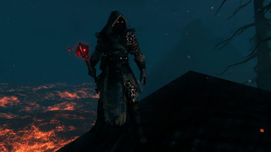 Valheim Ashlands update - A person stands on a rock near lava, wearing the hooded Embla armor set and holding a glowing red scepter.