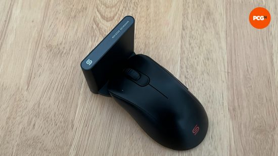 Zowie EC2-CW gaming mouse in charging stand