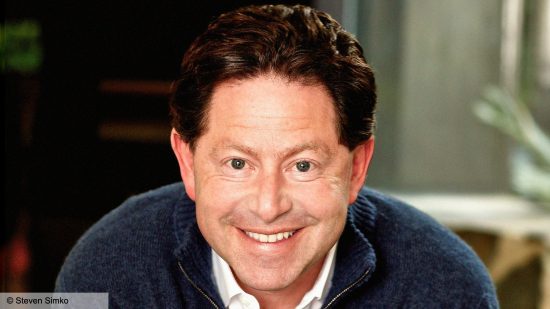 Activision Blizzard CEO retires: Bobby Kotick, a man with curly short brown hair, smiling