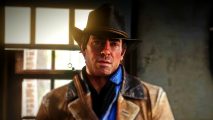 Red Dead Redemption 3: Arthur Morgan, a man with a cowboy-like western hat and brown leather jacket stands with his head slightly tilted and lips parted
