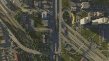 Cities Skylines 2 modding high priority: an aerial view of a winding highway