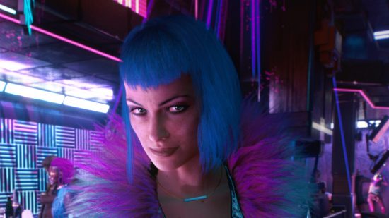 A woman with blue har and a purple fluffy jacket in a neon bar.