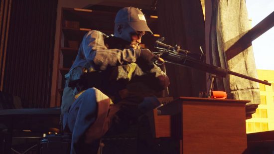 Controversial and “realistic” FPS Ready or Not hits full 1.0 release: A mean in a spec ops outfit kneeling down looking through a sniper rifle lens out of a window in front of a bare wooden cabinet