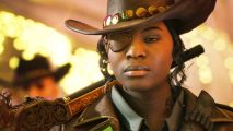 A cowboy-looking woman with an eyepatch and a shotgun on her shoulder.