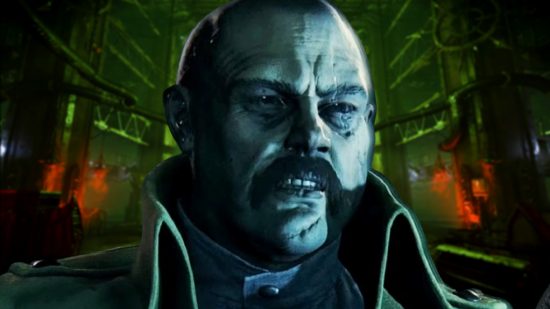 Warhammer 40k The Traitor Curse part two - A man with a shaved head and a moustache stands in a green-lit laboratory.