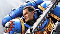 Warhammer 40k Henry Cavill update: a big man with a chainsaw sword in massive blue armor