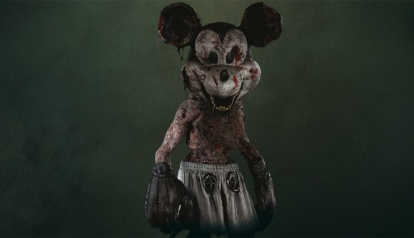 Image of bloodied shirtless man standing in a dark room with a Mickey Mouse head.