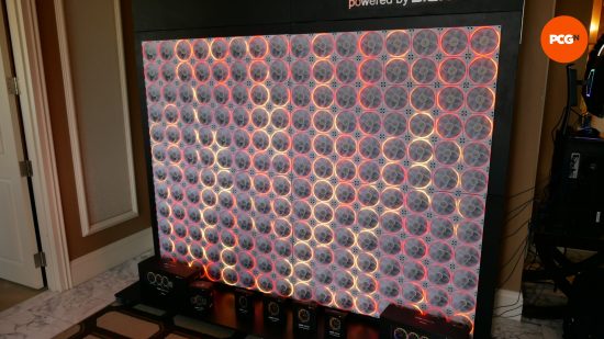 Photo of the be quiet fan wall at CES displaying a fire-like color pattern