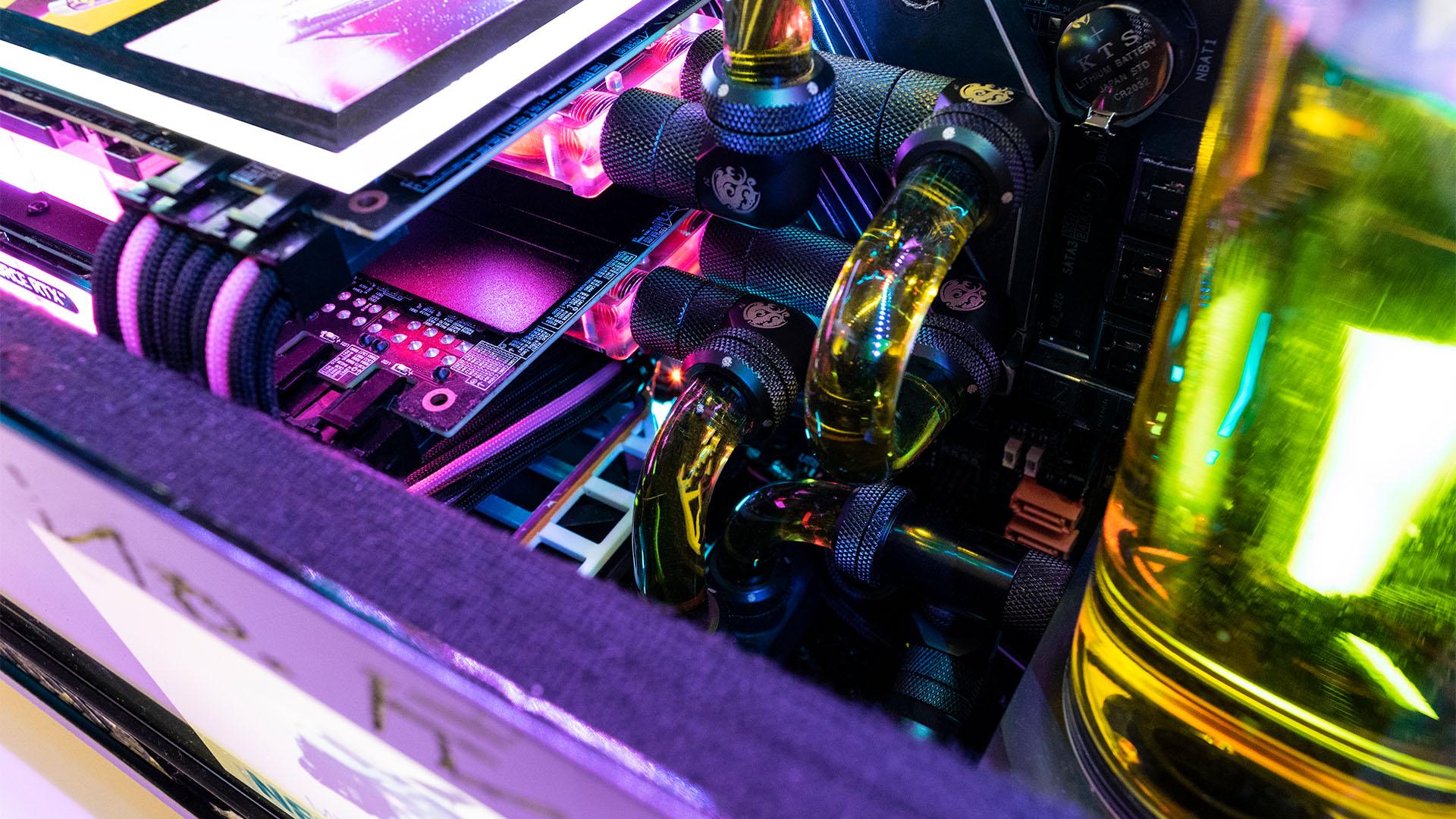 The yellow custom acrylic tubing for a Cyberpunk 2077 water cooling loop
