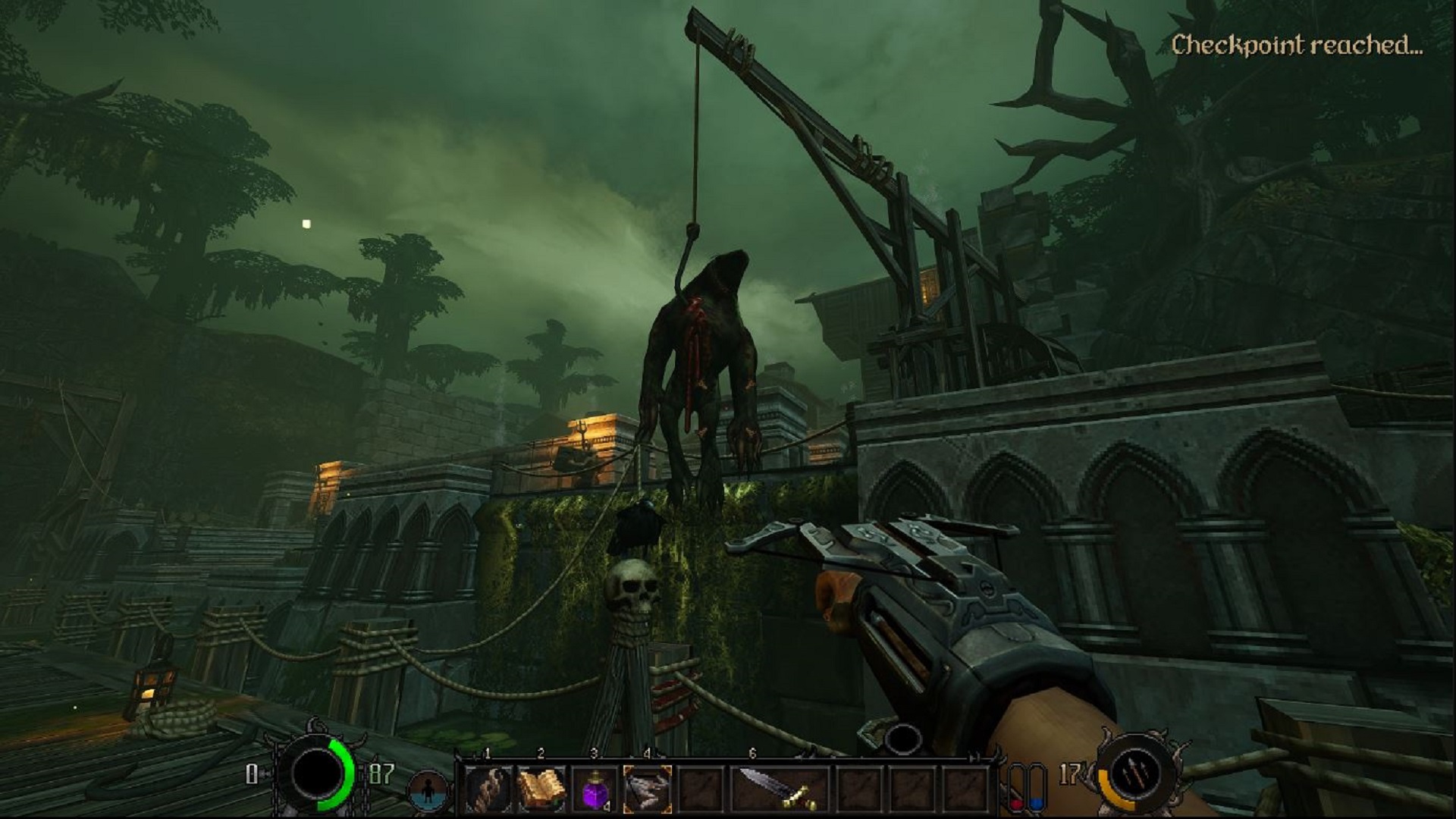 The player character looks across a dock. There is a monster hanging from a fishing hook and a skull mounted on a wooden stake. In the background, an NPC carries a box of goods.