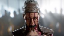 Hellblade 2 developer direct: a woman dressed in Scandinavian looking tribal gear