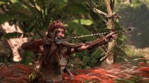 The protagonist for Horizon Forbidden West pulls an arrow in her bow, aiming at an enemy