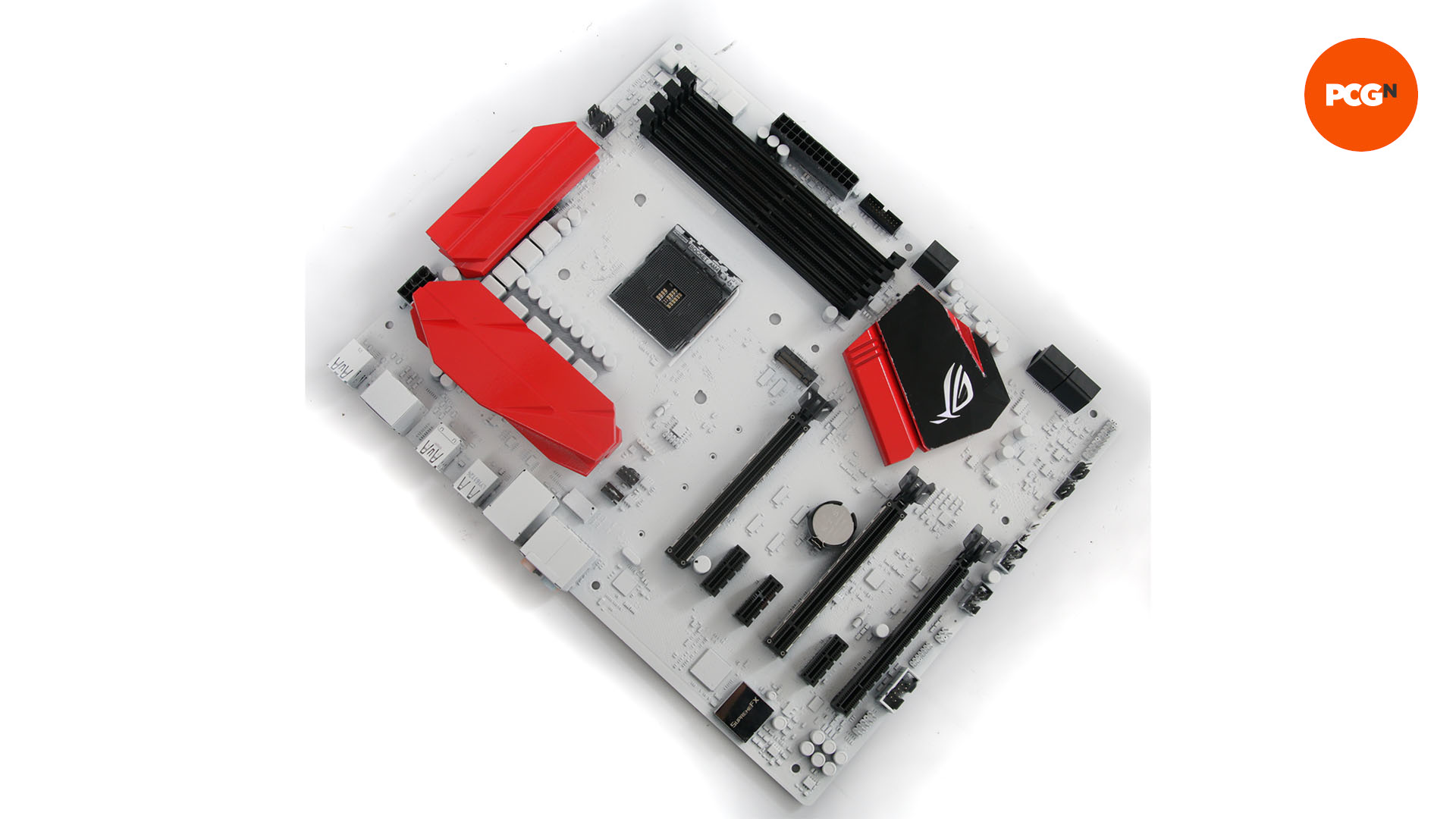 The painted motherboard is reassembled and is now black, red, and white