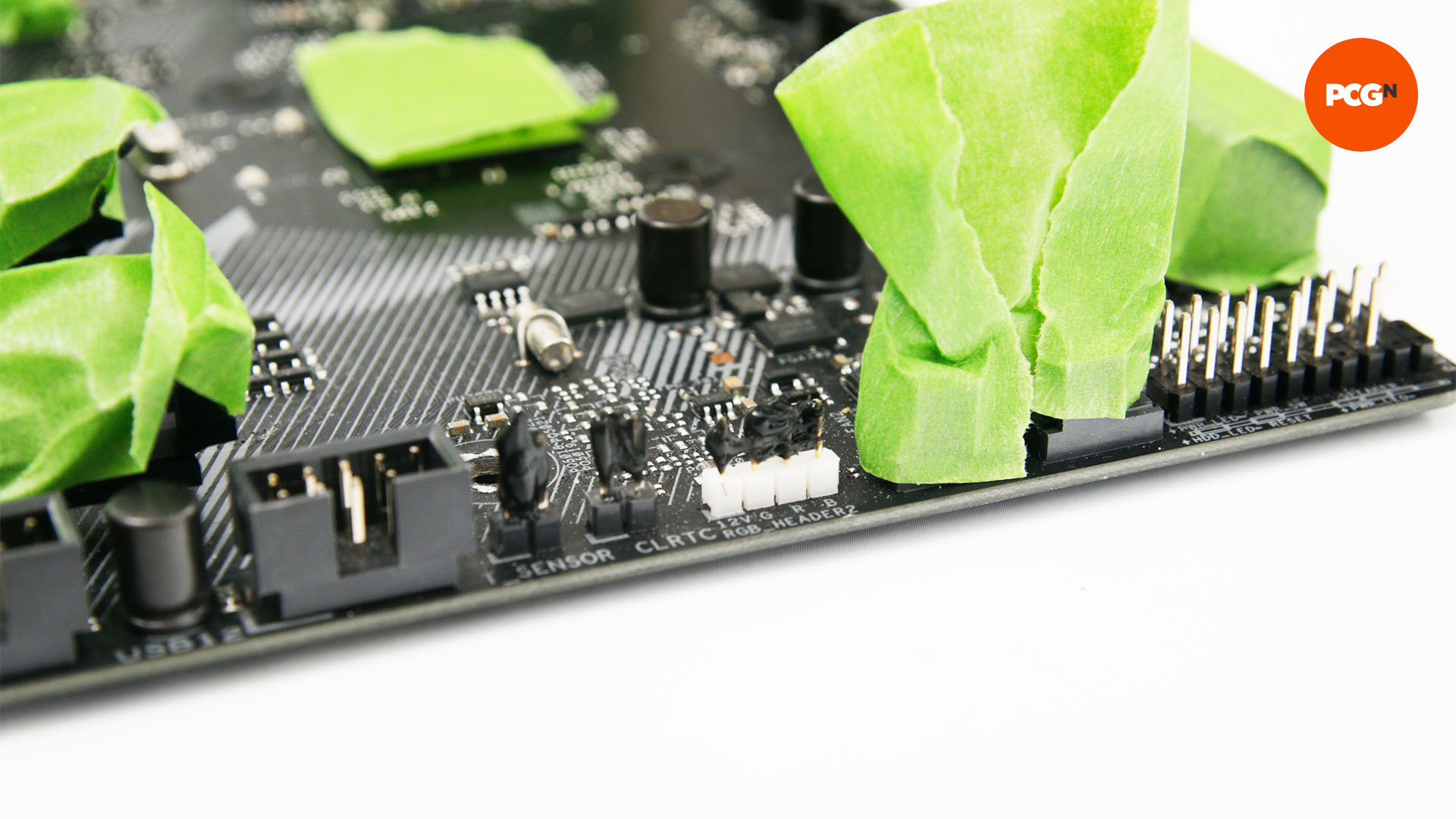 Pins and ports are sprayed with silicon so they aren't damaged during the motherboard painting process