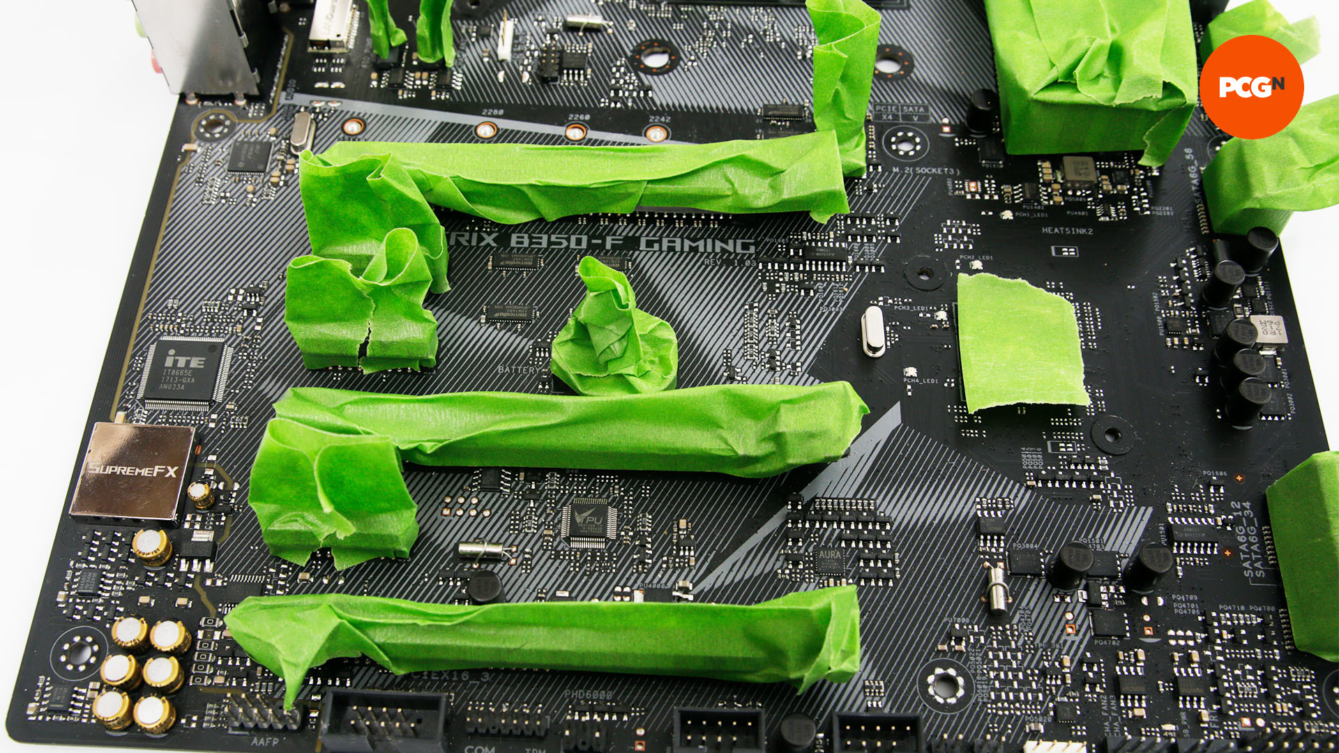 The RAM slots are covered in frog tape so the board can be painted