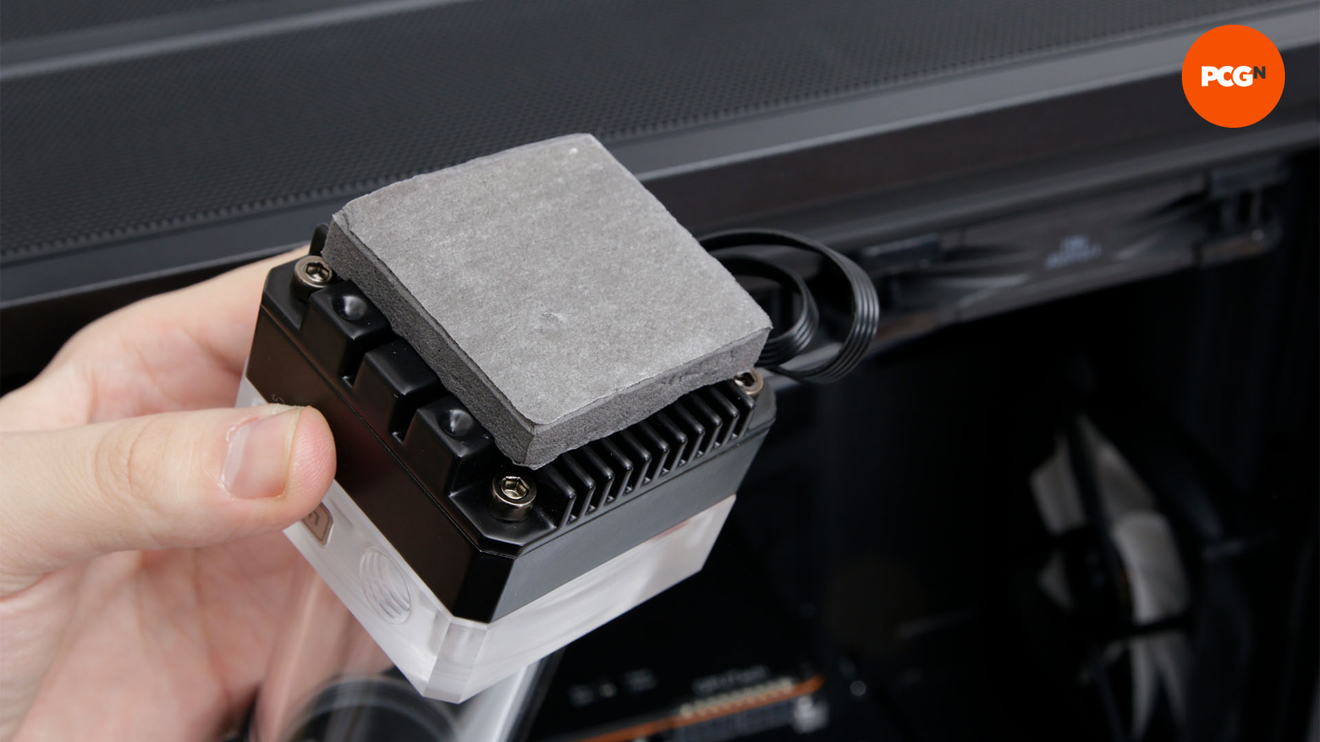 How to water cool your PC: Adhesive foam pad on reservoir