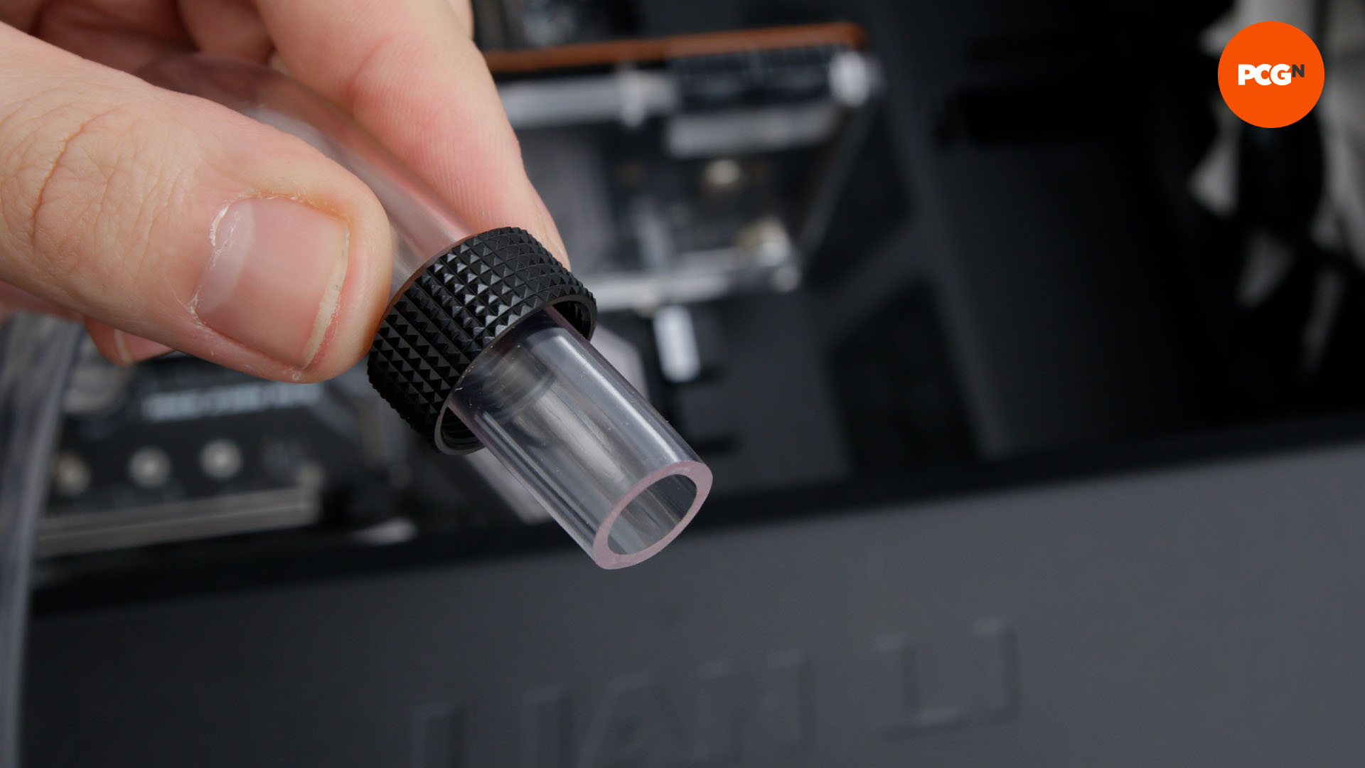 How to water cool your PC: install locking ring on tubing